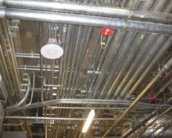 Magnetic field ceiling shield to reduce conduit magnetic fields in main electrical room at Duke Cancer Center.